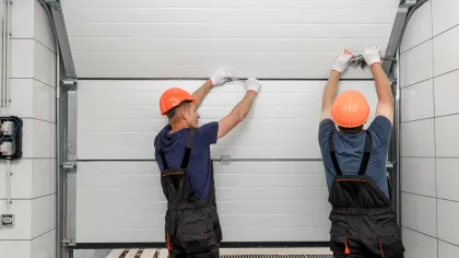 a few men wearing hard hats