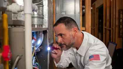 Bardi technician diagnosing a residential furnace repair