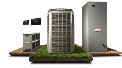 Lennox HVAC system components including thermostat, air handler, heat pump, and furnace displayed on grass and wood platform.