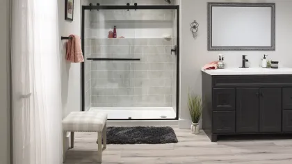a bathroom with a mirror and a shelf
