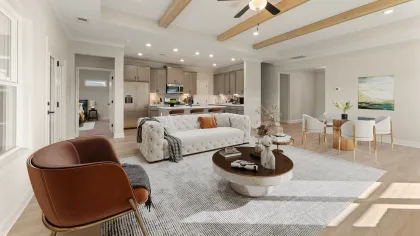 a living room with a large chandelier and a couch