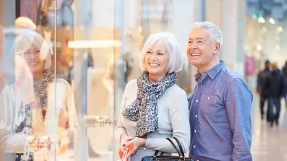a man and a woman smiling