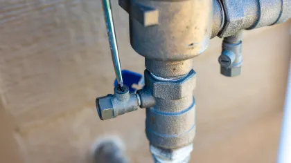 close-up of a pipe being repaired
