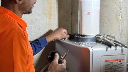 Estes Services Plumber installing a tankless water heater
