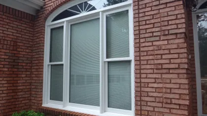 a window in a brick building