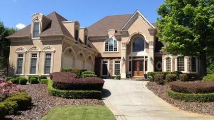 a large house with a front yard