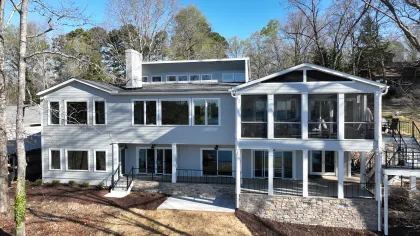 a white house with a blue sky
