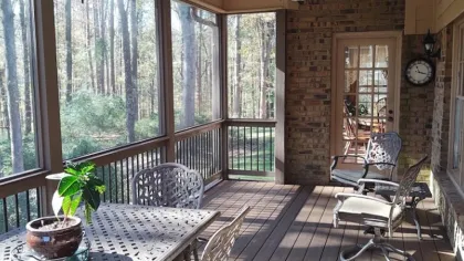 a room with a table and chairs