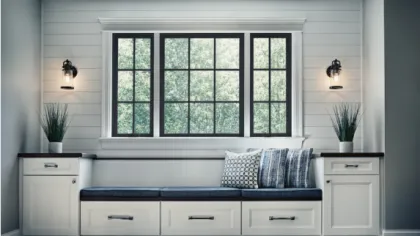 a white kitchen with a window