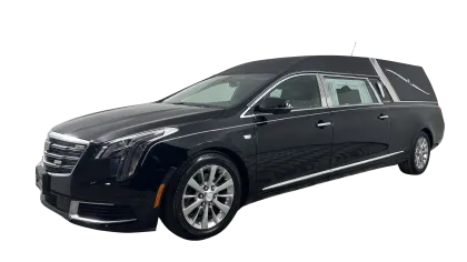 Black luxury hearse vehicle with extended rear compartment and sleek modern design on white background