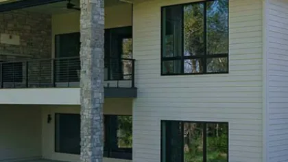 a house with a tree in the front