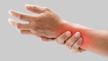 a person holding their wrist