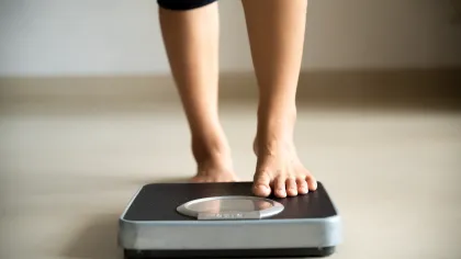 a person's feet on a scale
