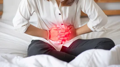 a person holding their stomach