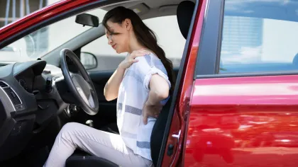 a person sitting in a car