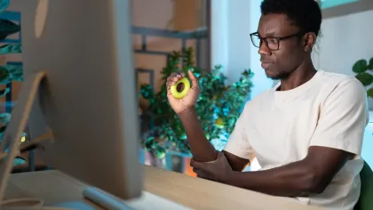 a man holding a ball
