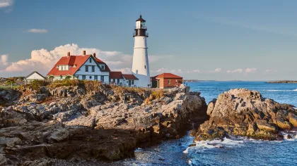 a lighthouse on a rocky shore