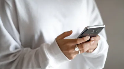 a man holding a cell phone