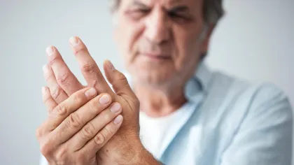 a man holding his hand up