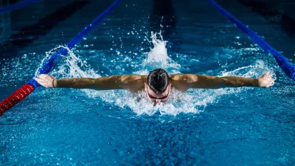 a person swimming in a pool