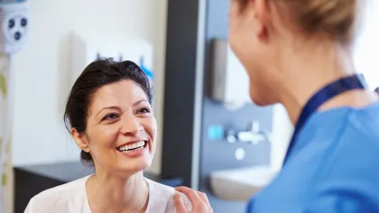 a doctor talking to a patient