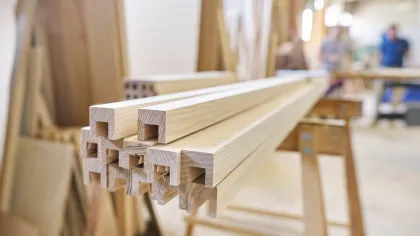 a wooden bench in a room