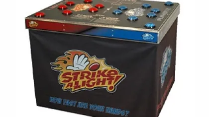 Strike 4 Light tabletop game with red and blue buttons for fast-paced reaction play in a compact design.