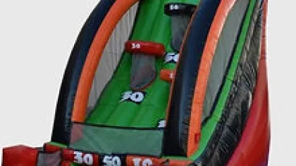 Inflatable basketball arcade game with scoring zones and netted sides for safe play.