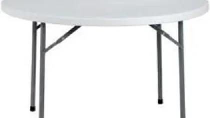 Round white folding table with metal legs and black foot caps, suitable for indoor and outdoor use.