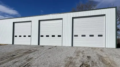 a white building with a few doors