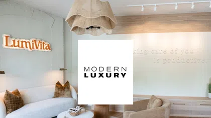 Modern luxury living room with cozy beige and white furniture, wooden accents, and soft lighting in a stylish space.