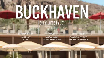 Buckhaven City Lifestyle cover with red umbrellas and scenic desert background.
