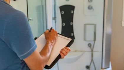 a man standing in a bathroom
