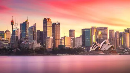 a city skyline at sunset