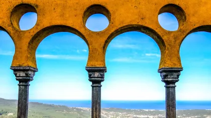 a group of arches over water