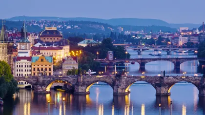 a bridge over a river with buildings on either side of it