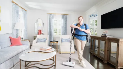 a person cleaning a room
