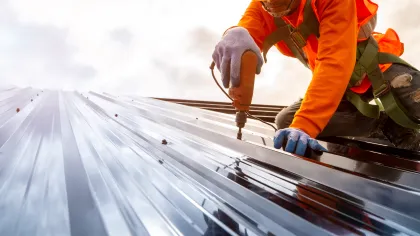 Master Roofers installing a metal roof in New Hampshire