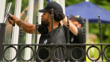 a man holding a gun