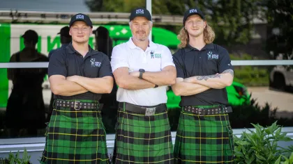 a group of men in kilts