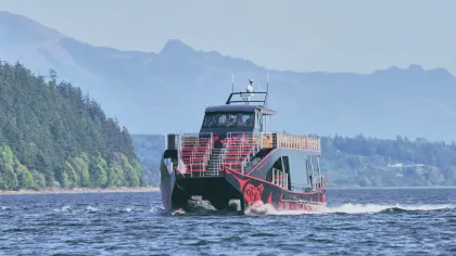 a small boat in a large body of water