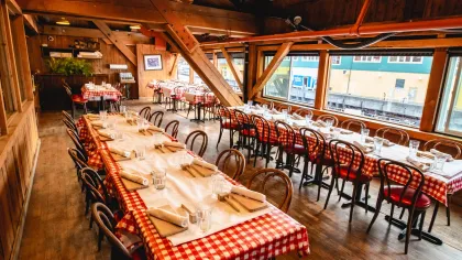 a restaurant with tables and chairs