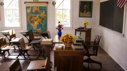 a room with tables and chairs