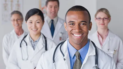 Brandon Hirsch et al. in white lab coats