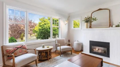 a living room with a fireplace