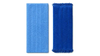 Two blue microfiber mop pads with different textures and designs on a white background.