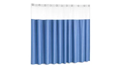 Blue and white fabric shower curtain with metal grommets and textured top panel hanging in folds.