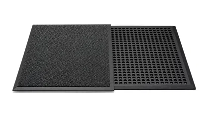Two black anti-fatigue floor mats with one side textured and the other perforated for drainage.
