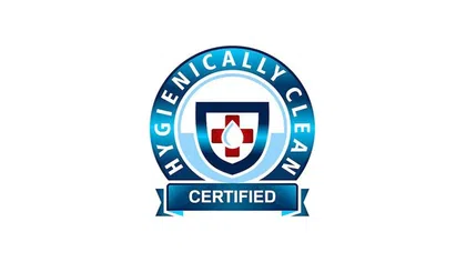 Blue and white Hygienically Clean Certified badge with a shield, red cross, and water droplet symbol