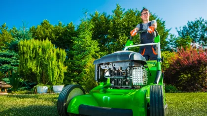 a person driving a tractor
